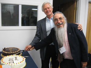 Director Arne Henden and President Jaime Garcia cut the leadership banquet cake.